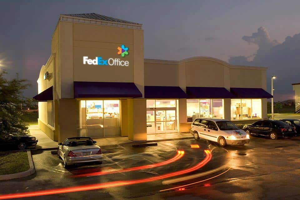 FedEx closes offices and freezes hiring as global delivery numbers drop
